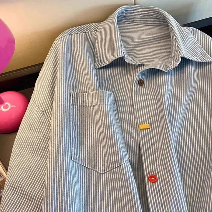 Chelsea | Blouse rayée élégante aux détails colorés
