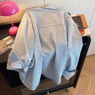 Chelsea | Blouse rayée élégante aux détails colorés
